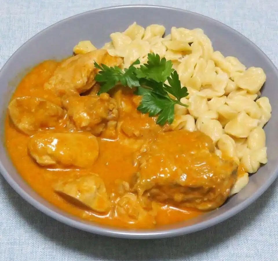 Traditional Hungarian Chicken Paprikash with Nokedli
